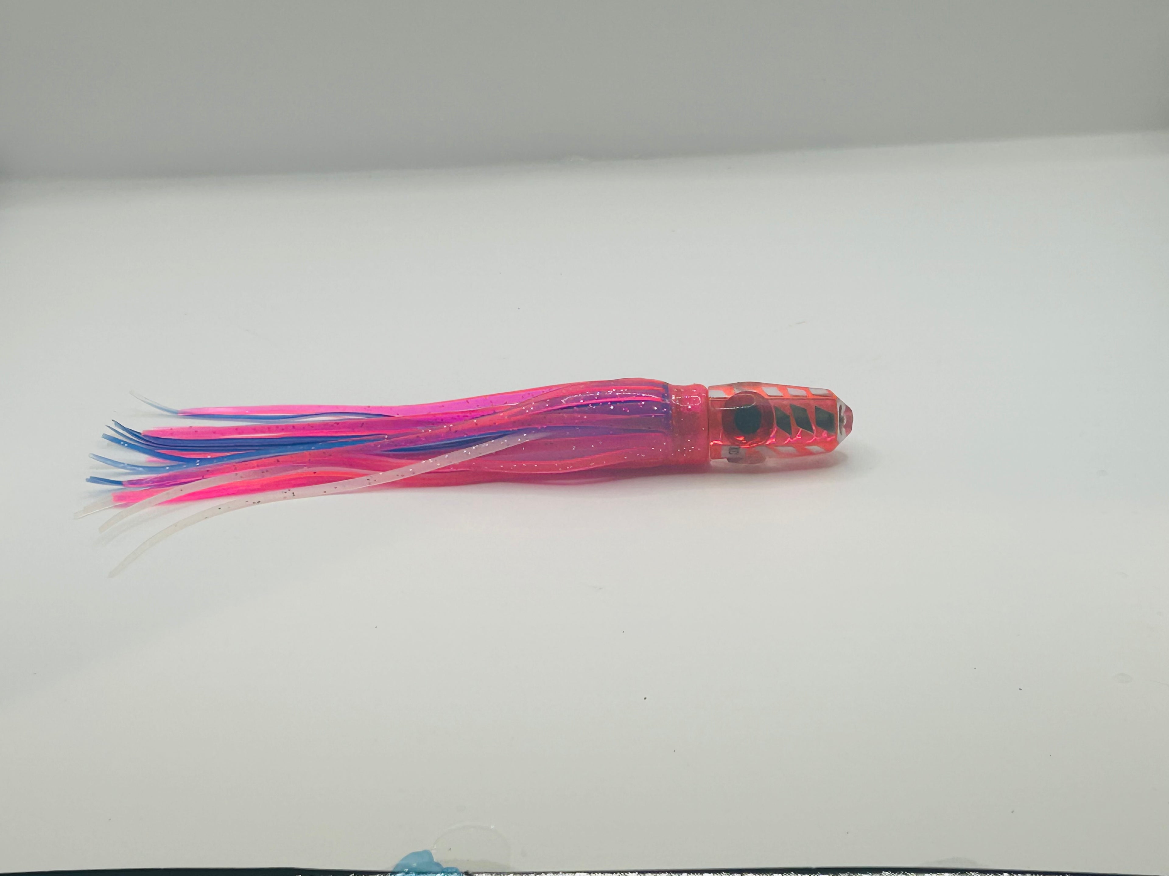 KC Lures - 5” Pink Cracked Glass Single Hole Bullet New Skirts Pink over Blue and White.