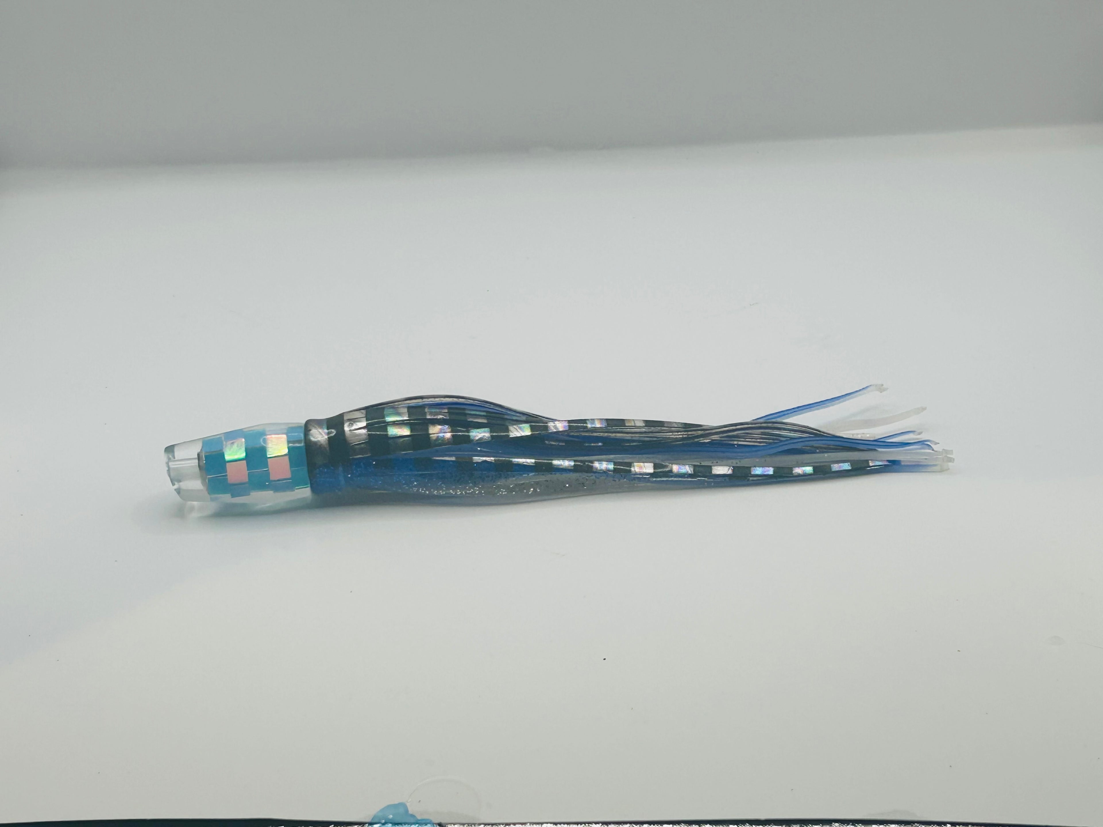 KC Lures - 5” Disco Blueberry RT Slant Skirted in Blue and Silver over Blue and White.